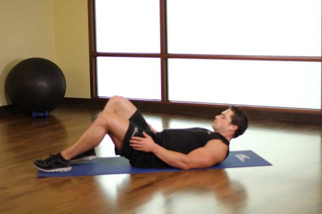 Starting position of Ankle On The Knee