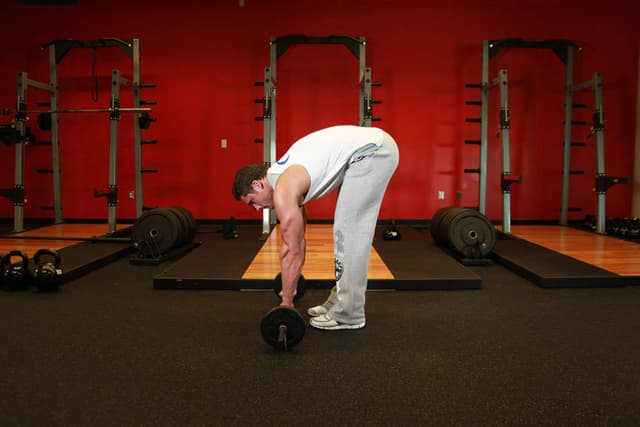 Starting position of Barbell Ab Rollout