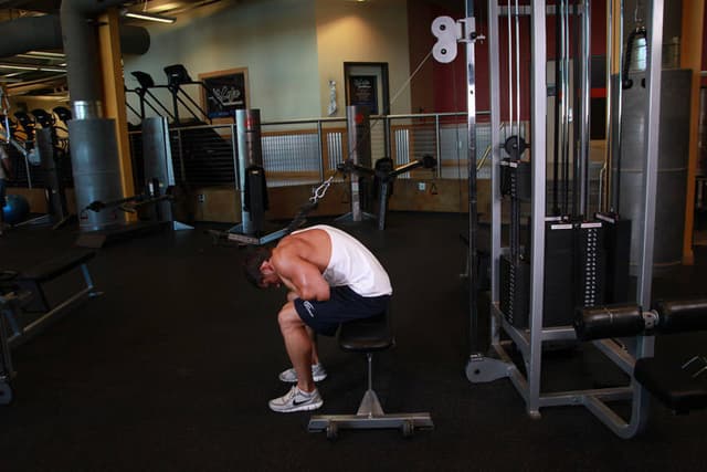 Ending position of Cable Seated Crunch