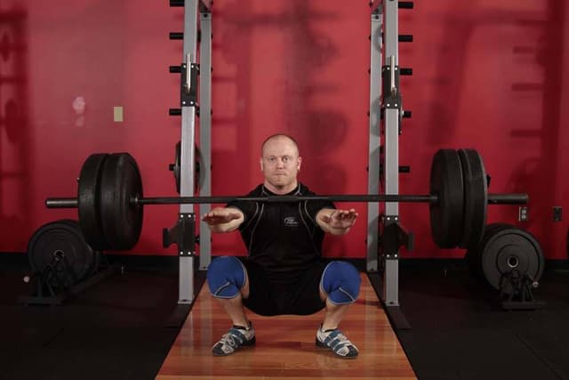 Ending position of Frankenstein Squat