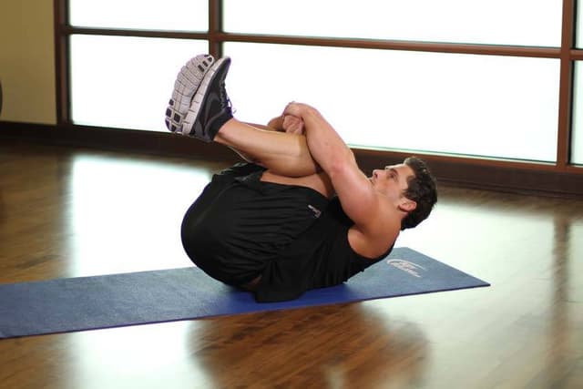 Ending position of Hug Knees To Chest