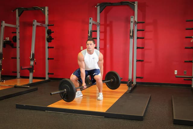 Ending position of Jefferson Squats