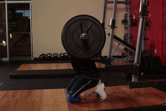 Ending position of Kneeling Jump Squat