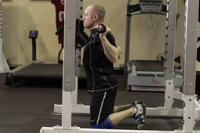 Starting position of Kneeling Squat