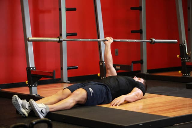 Ending position of One Arm Floor Press