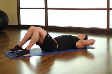 Starting position of One Knee To Chest